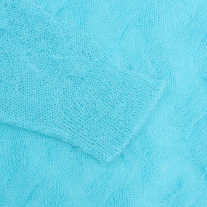 LOOSE KNIT CROSS CABLE