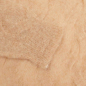 LOOSE KNIT CROSS CABLE